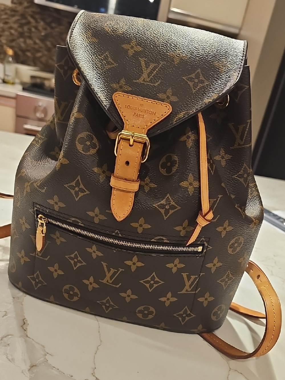 Louis Vuitton Monogram Canvas Drawstring Backpack in Brown & Tan